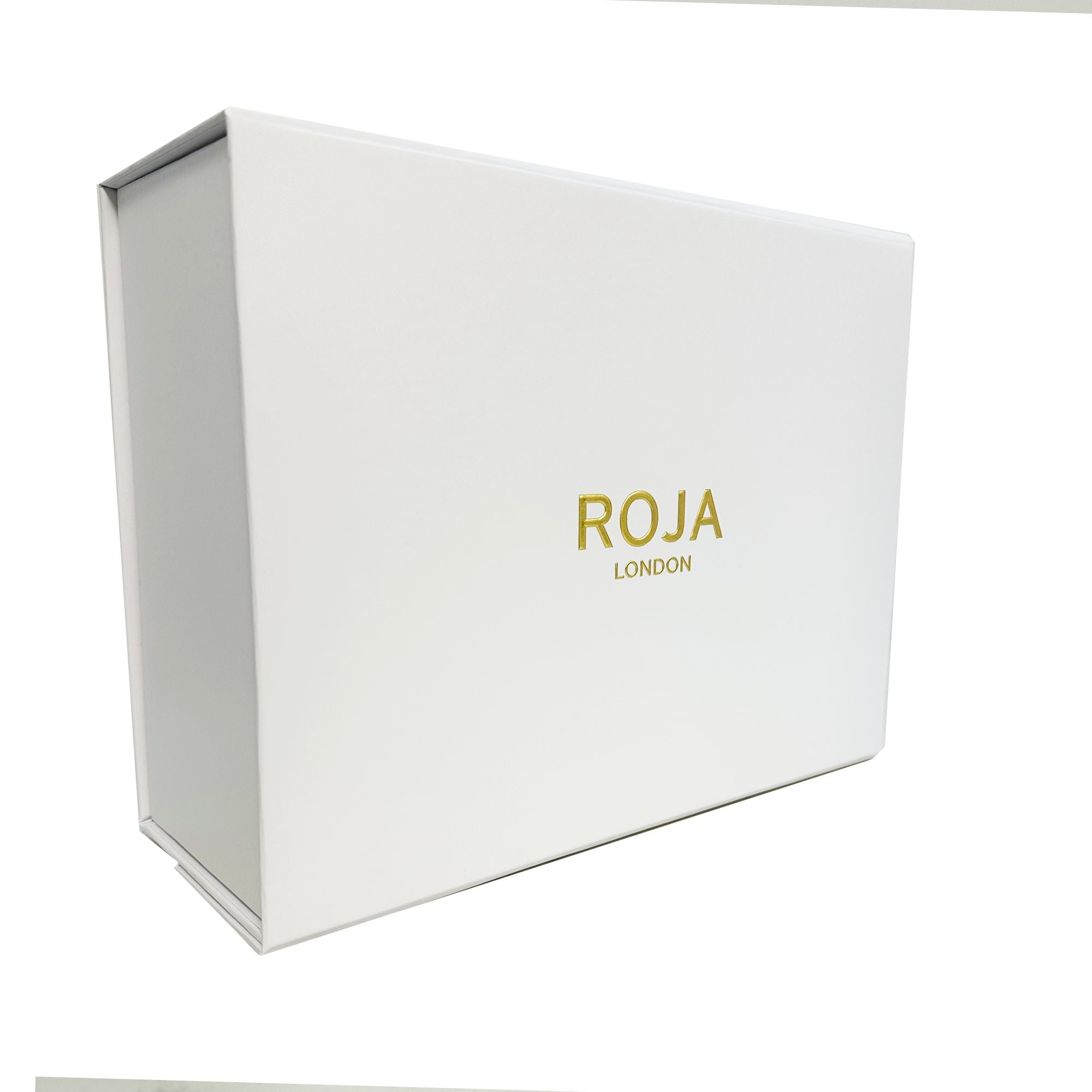 A white rectangular box with gold ROJA PARFUMS branding sits against a plain background—perfect for presenting The Aoud Layering Gift Set, inspired by luxurious Oud and exquisite Agar Wood.